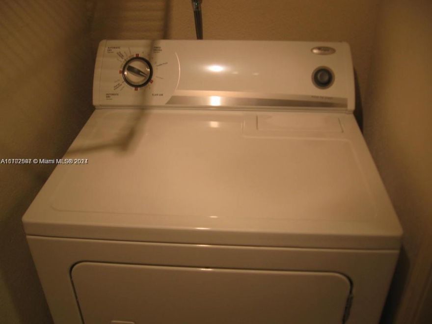 Attention Investors. 2/2 Split bedroom unit. Vaulted ceilings, pool view, all neutral colors, kitchen with stainless Steel Apllaince. Complex features: Club House, Fitness Center, Community Pool, at walking distance from the Coral Square Mall. Movie Theaters, Restaurants, Shops and Schools. Must see.