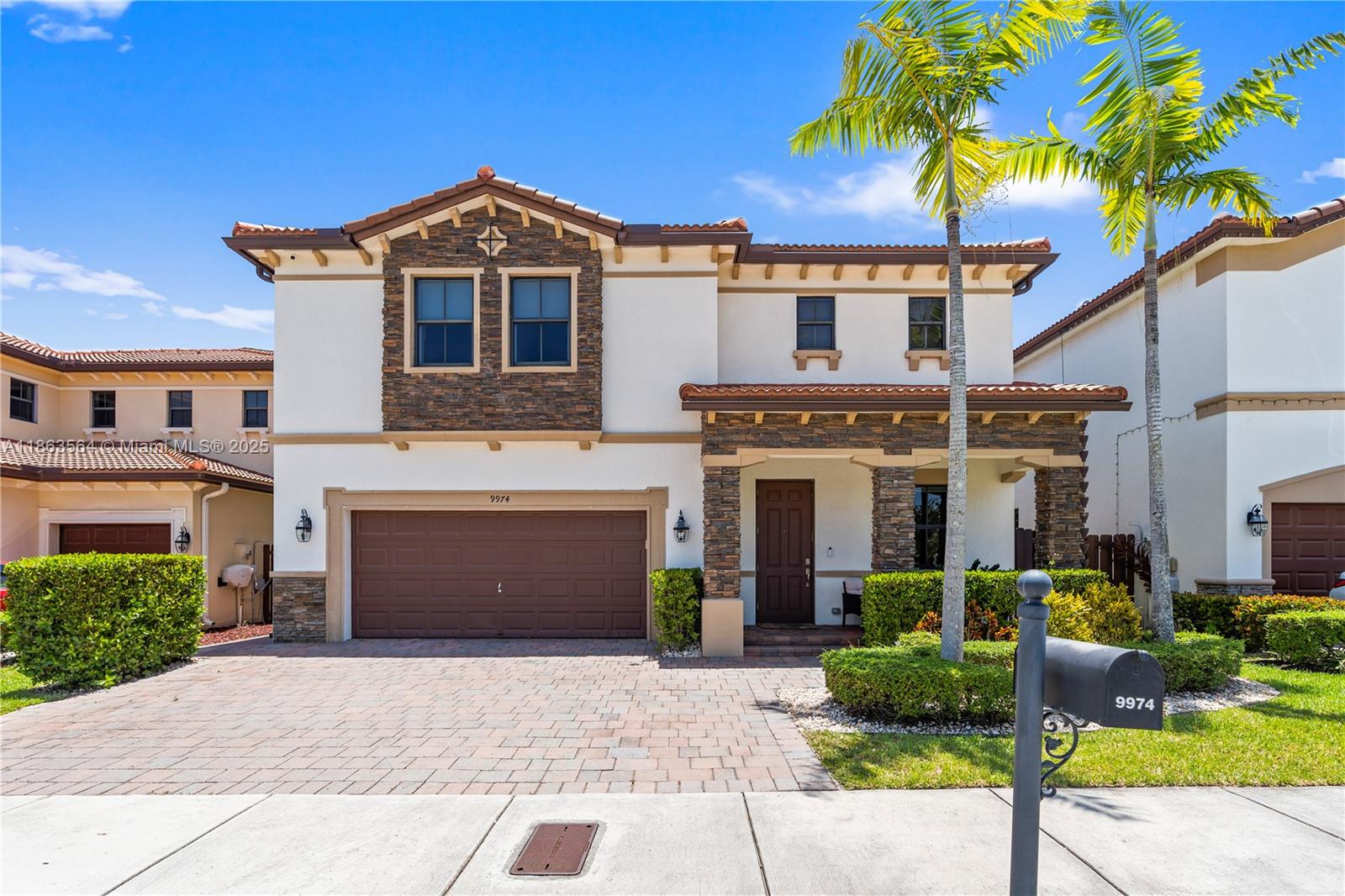 Live in your own Doral paradise at Isles at Grand Bay, a secure, gated community. This spacious, partially furnished and remodeled 4-bedroom, 3.5-bathroom home offers serene water views making every day feel like a getaway. The updated kitchen features sleek stainless steel appliances and stunning Taj Mahal stone countertops. For your health and comfort, a whole-house water filtration system provides premium water for showering and bathing, and a separate reverse osmosis filter ensures you have the purest drinking water. Enjoy a worry-free lifestyle with the included security cameras and the convenience of being near great schools, shops, and highways. The community's amazing Club House is your personal resort, complete with a swimming pool, gym, courts, and a kid's park.
