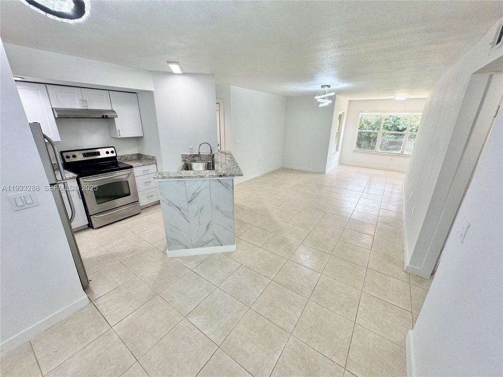 Photo of 643 Vista Isles Dr #1813, Sunrise, FL 33325 (MLS # A11933288)