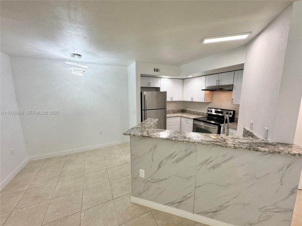 Photo of 643 Vista Isles Dr #1813, Sunrise, FL 33325 (MLS # A11933288)