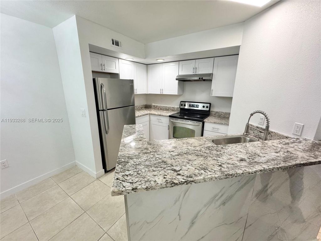 Photo of 643 Vista Isles Dr #1813, Sunrise, FL 33325 (MLS # A11933288)