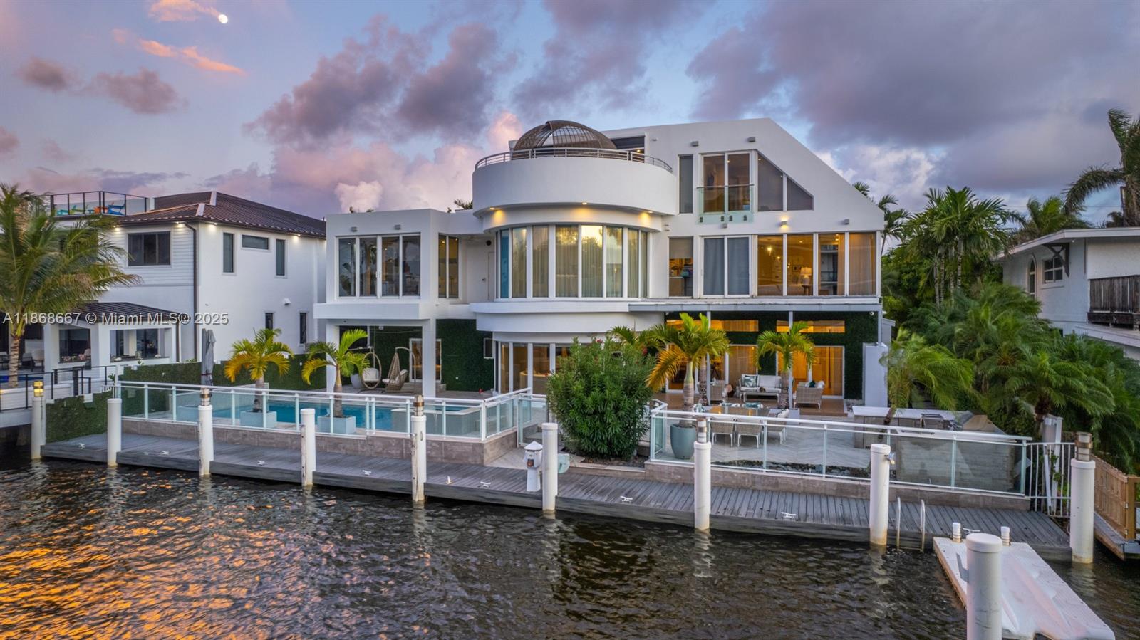 Step into the epitome of contemporary luxury with this stunning 7BR/8.5BA waterfront masterpiece in Fort Lauderdale. Boasting 90’ of frontage, this three-level estate captures breathtaking views from the primary suite, rooftop patio, and lush backyard. Walls of glass, open floor plan, impact windows, top-of-the-line appliances, and advanced security define modern elegance. Entertain with a rooftop terrace, summer kitchen, and private dock. Fully furnished and available for immediate occupancy.