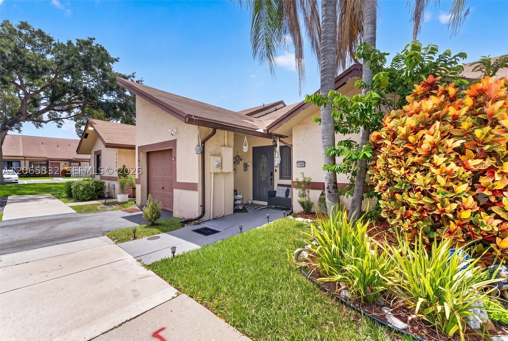 Photo of 11083 NW 38th Pl, Sunrise, FL 33351 (MLS # A12065832)