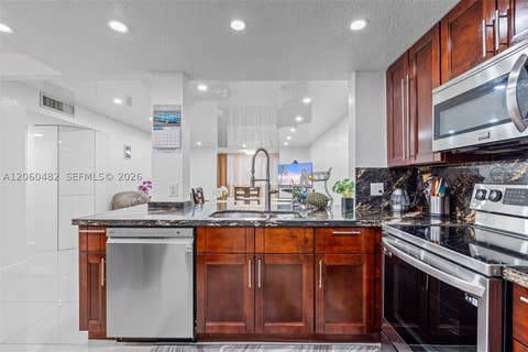 Photo of 301 NE 14th Ave #207, Hallandale Beach, FL 33009 (MLS # A12060482)