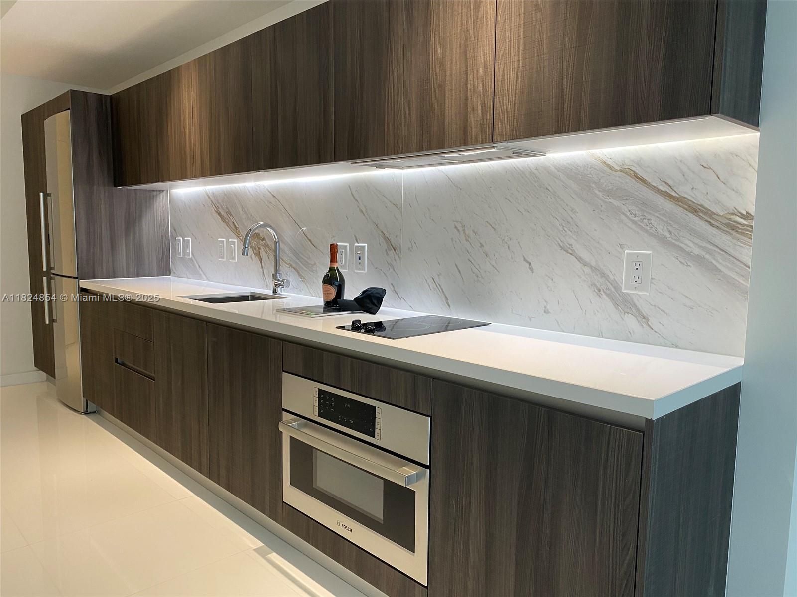 Own in the most amenity-rich building in the world. This upgraded condo features marble finishes in the kitchen and bathroom, and comes fully furnished—perfect to live in or rent out. Currently generating $4,000–$5,000/month on Airbnb. Paramount allows only studios to be rented monthly. Amenities include 5 pools, basketball, tennis, soccer, raquetball, owner lounge, mini store, fully equipped gym, spa, massage chairs, entertainment room, and much more. Just steps you have the restaurants and stores, including Apple Store, Bowling, bars, Bayside market place, Kaseya Center Bayfront park, Brightline, metro mover, Cruise docks and much more. LOCATION, LOCATION, LOCATION