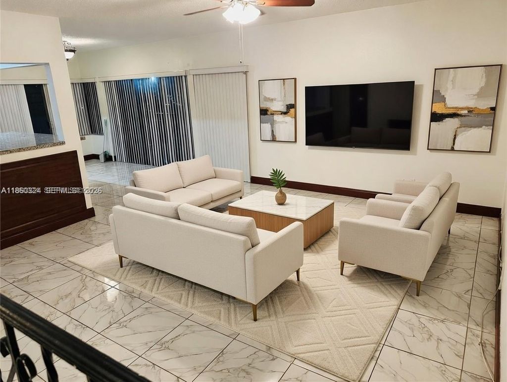 Photo of 4850 SW 63rd Ter #323, Davie, FL 33314 (MLS # A11860324)