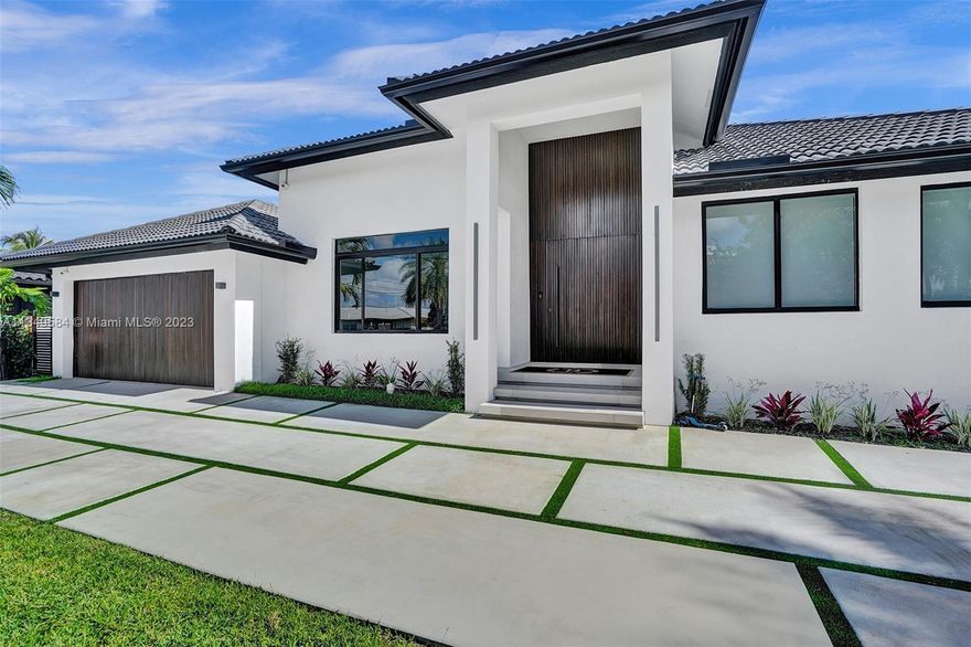 Live the POSCH life in this highly coveted, guard gated Eastern Shores waterfront home. This natural bright light beauty boasts impeccable decorator finishes such as Veneta Cucine chef’s kitchen, custom LED under stair accent lighting, European wood pivot front door, interior 96” high Italian doors, 18’ ceilings, wood paneled accent wall and long planked wood floors. 5 bdms + nanny suite & playroom/gym. Smart technology system with speakers, cameras and automated lighting throughout. Ideal layout for indoor/outdoor living, relaxation or entertaining. The backyard has a full cabana bath, summer kitchen, limestone tiled backyard, mosaic tiled salt water/heated pool, new dock and beautiful views. No fixed bridges to ocean. Located near best beaches, shopping, restaurants, airport & nightlife.