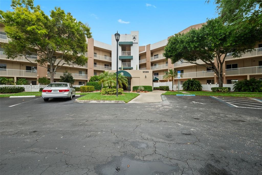 Photo of 9599 Weldon Cir #A112, Tamarac, FL 33321 (MLS # A11986343)