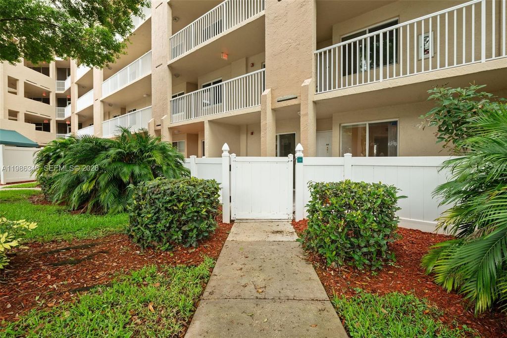 Photo of 9599 Weldon Cir #A112, Tamarac, FL 33321 (MLS # A11986343)