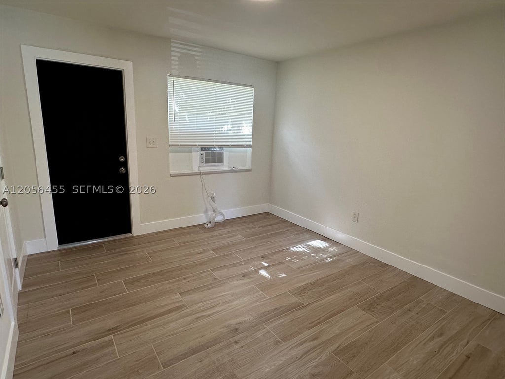 Photo of 1048 E Avenue E #3, Riviera Beach, FL 33404 (MLS # A12056455)