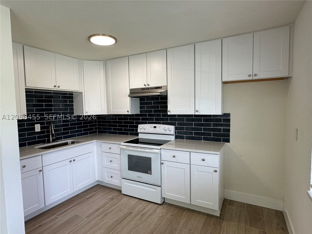 Photo of 1048 E Avenue E #3, Riviera Beach, FL 33404 (MLS # A12056455)