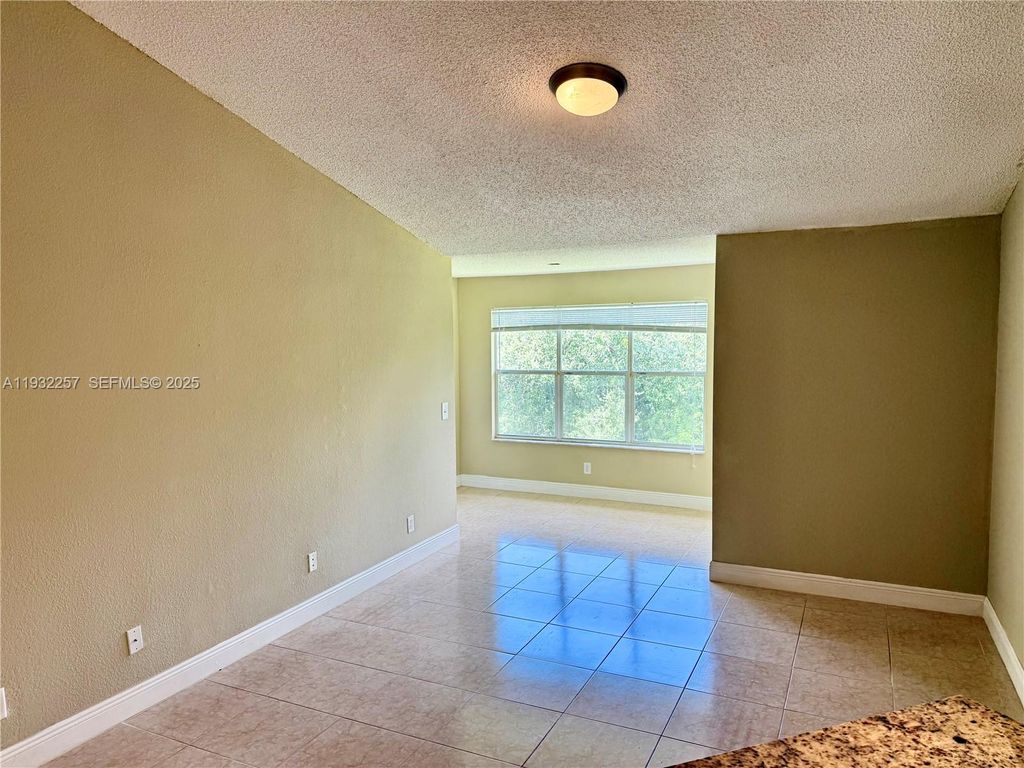 Photo of 595 Vista Isles Dr #1923, Sunrise, FL 33325 (MLS # A11932257)