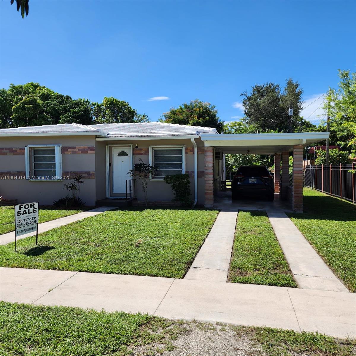 MUST SEE FRESHLY PAINTED INSIDE/OUT NORTH MIAMI GEM! Beautiful remodeled North Miami Home, renovated 2beds/1bath, tile floors and ample closets. Bathroom is newly updated. Florida Room and Awning windows overlook the large chain linked fenced backyard that has many possibilities. Kitchen immaculate with updated appliances to include Range, Refrigerator, Dishwasher, Disposal, Microwave(Excellent condition)and under the counter lights. Additional features: Washer and Dryer, Storage area, Attic, Fredrich 21,000 BTU A/C wall unit in living room, 3 Ceiling fans one in each room with lights and hurricane accordion shutters. Plumbing updated in 2016. Carport to protect your car from the sun and rain. Termite inspection and tenting was done 8-11-25. This turnkey home is ready to move-in and enjoy!
