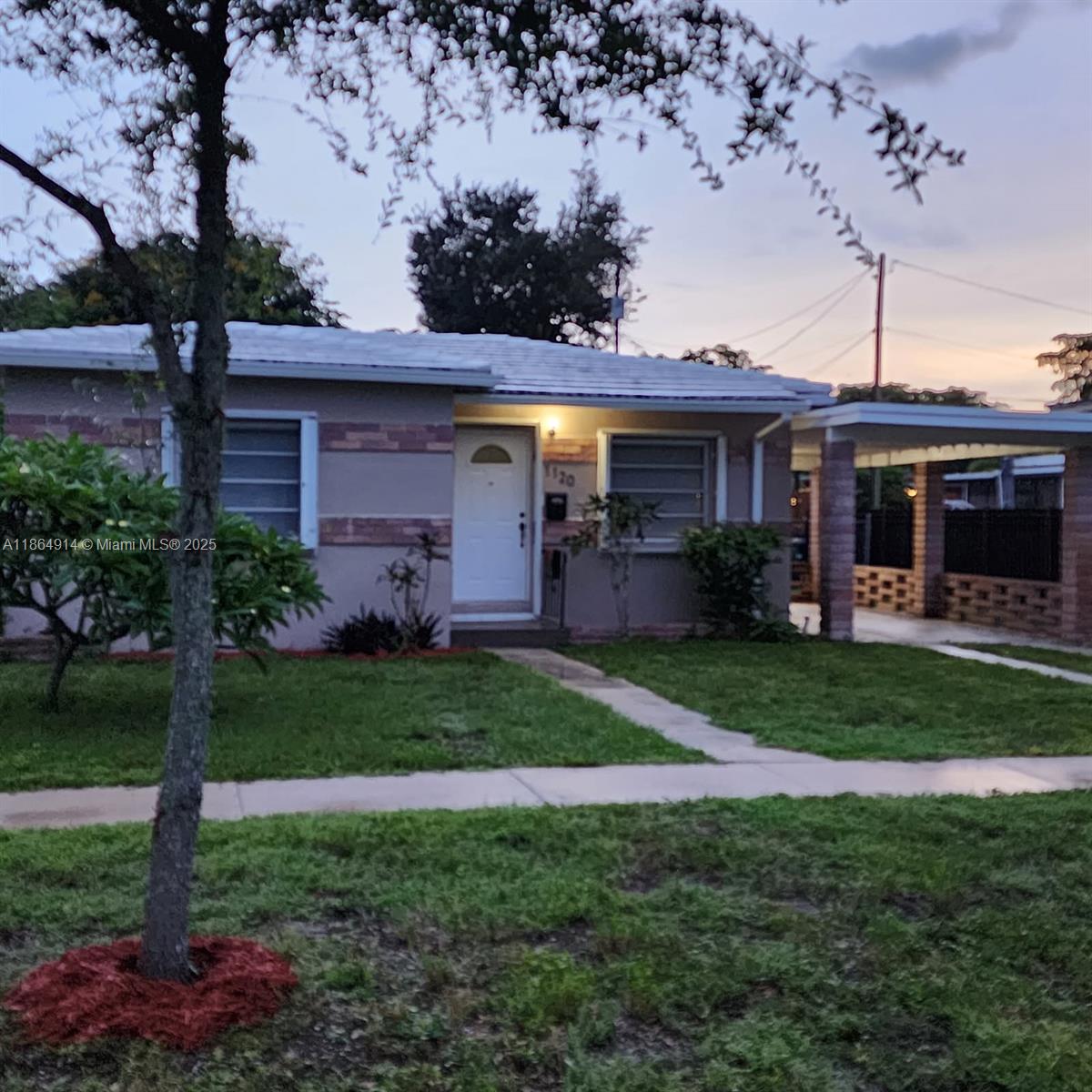 MUST SEE FRESHLY PAINTED INSIDE/OUT NORTH MIAMI GEM! Beautiful remodeled North Miami Home, renovated 2beds/1bath, tile floors and ample closets. Bathroom is newly updated. Florida Room and Awning windows overlook the large chain linked fenced backyard that has many possibilities. Kitchen immaculate with updated appliances to include Range, Refrigerator, Dishwasher, Disposal, Microwave(Excellent condition)and under the counter lights. Additional features: Washer and Dryer, Storage area, Attic, Fredrich 21,000 BTU A/C wall unit in living room, 3 Ceiling fans one in each room with lights and hurricane accordion shutters. Plumbing updated in 2016. Carport to protect your car from the sun and rain. Termite inspection and tenting was done 8-11-25. This turnkey home is ready to move-in and enjoy!
