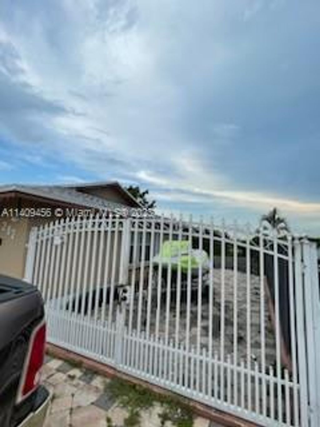 Photo of 217 Azucana Rd, South Bay, FL 33493 (MLS # A11409456)