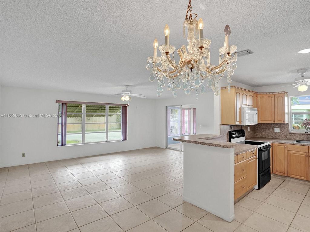 Photo of 3220 Park Ln #A, Boynton Beach, FL 33435 (MLS # A11552690)