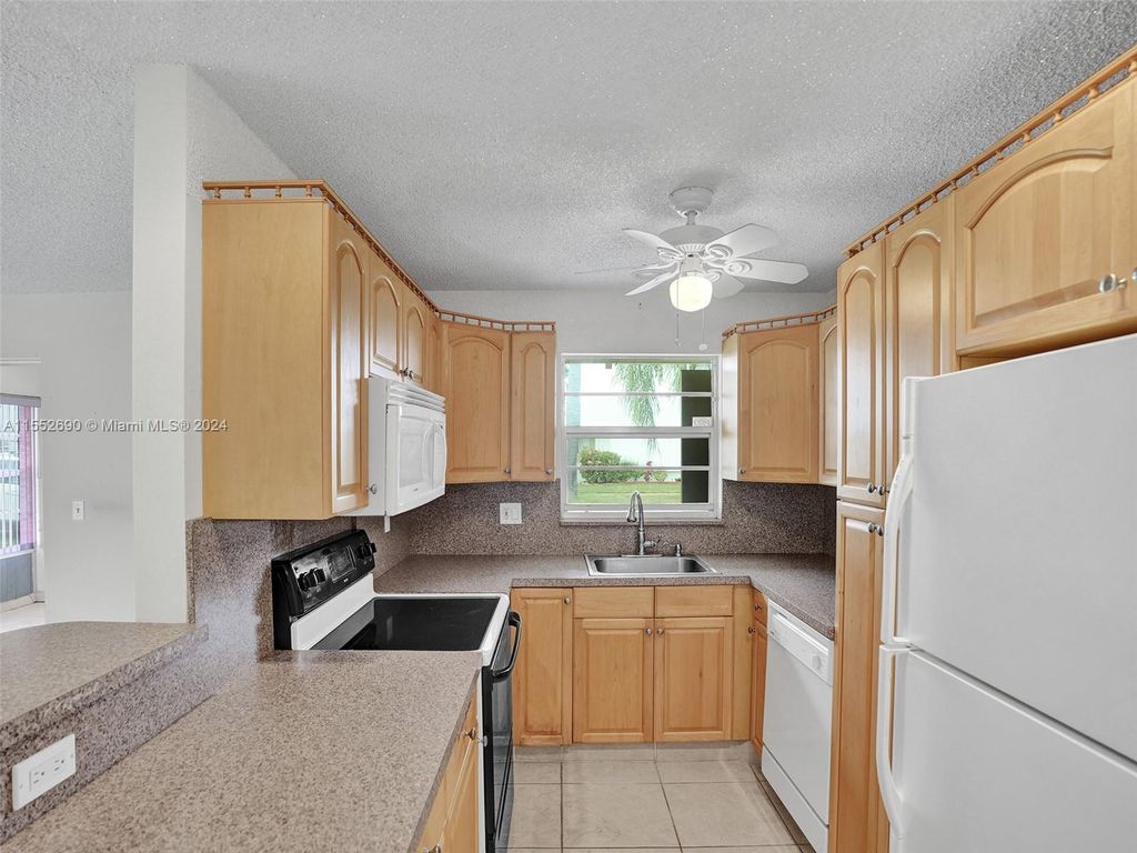 Photo of 3220 Park Ln #A, Boynton Beach, FL 33435 (MLS # A11552690)