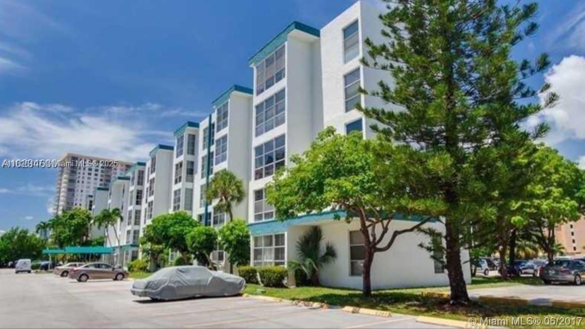 JUST REDUCED!! Just 2 blocks from the beach and shopping...this cozy 1 bedroom condo is the perfect choice for a beach getaway or year-round living. The lovely floor plan features a large great room, an extra enclosed den area, a small eat-in kitchen. Great Sunny Isles Beach location. A must see!