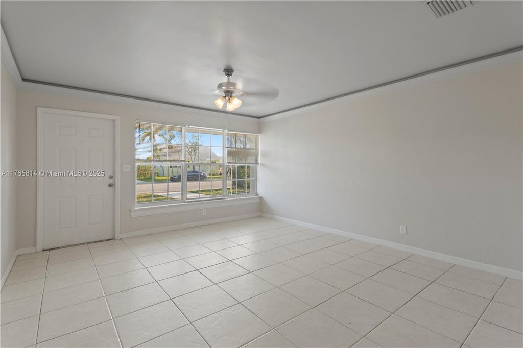 Photo of 625 Foresteria Dr, Lake Park, FL 33403 (MLS # A11765814)