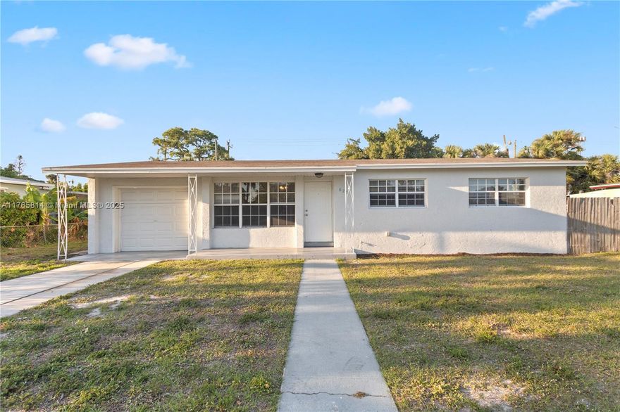 Nestled in the serene community of Lake Park, this single family home offers a perfect blend of comfort and functionality. Boasting four bedrooms and two bathrooms, this residence provides ample space for a growing family or those who love to entertain. The open concept layout seamlessly connects the living room, dining area, and kitchen, creating a warm and inviting atmosphere. Step outside to the backyard oasis, where you can relax on the patio and enjoy the peaceful surroundings. With its convenient location near schools, parks, and shopping centers, this home is the ideal place to create lasting memories with loved ones. Don't miss the opportunity to make this your dream home in Lake Park.