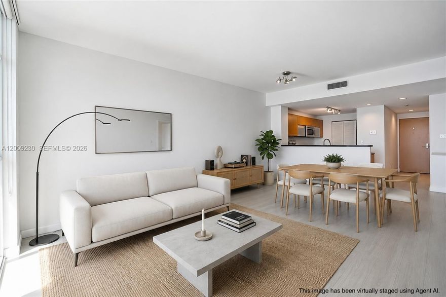 One-bedroom residence in the heart of Downtown Miami, offering 802 square feet of thoughtfully designed living. Soaring ceilings and unobstructed west-facing views fill the home with natural light and striking sunset vistas. Distinguished by superior construction and elevated finishes, the residence features premium solid cabinetry and a marble-appointed bath—details rarely found in comparable offerings. Ideally positioned moments from Miami’s premier dining, culture, and entertainment, this is an exceptional opportunity for a primary residence, pied-à-terre, or investment.