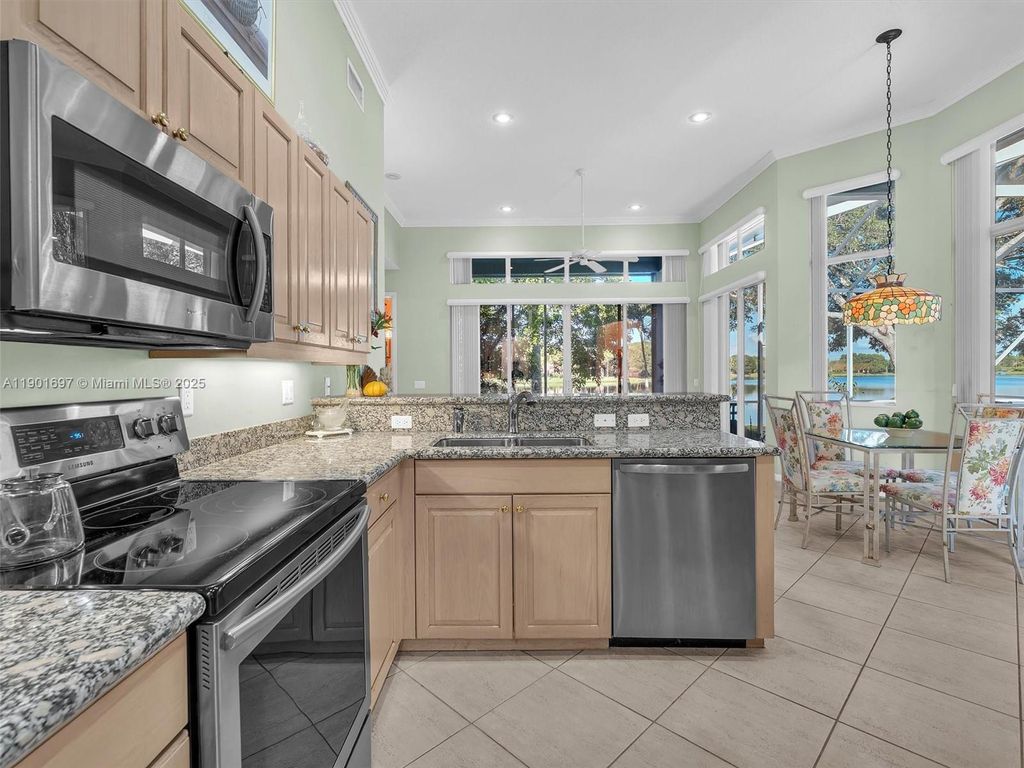 Photo of 302 NW 120th Dr, Coral Springs, FL 33071 (MLS # A11901697)