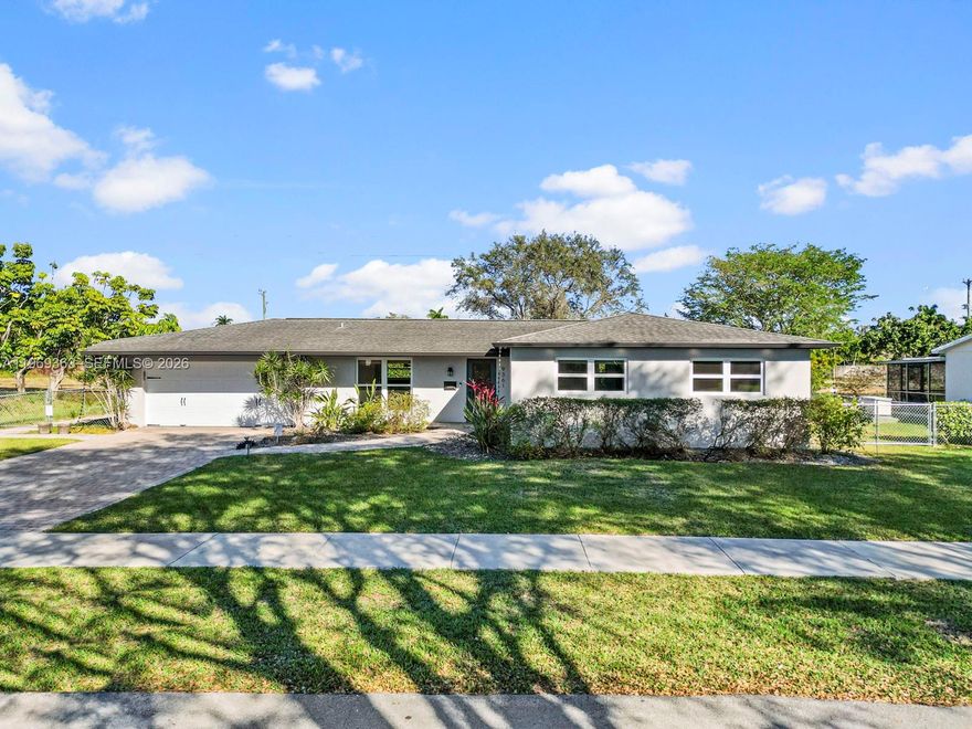 Experience elevated living in this 3 bed, 2.5 bath residence in the community of Kendale Country Club Estates. This home boasts complete impact windows and doors along with a newly installed flash water heater (2025). The seamless open-concept layout connects the living and dining areas, which are ready for your personal interior design touch. The kitchen welcomes you with stainless steel appliances and tranquil pool and garden views. A thoughtfully designed split floor plan ensures privacy, highlighted by a spacious primary bedroom with a charming bay window area and a modern bath featuring dual vanity sinks. The remaining 2 bedrooms offer generous square footage and custom-designed closets. The private backyard, lined with lush greenery, awaits you with an expansive patio and sparkling pool. Space for an outdoor summer kitchen/pergola, ready to be tailored into your backyard oasis. Air-conditioned 2-car garage with designated half bathroom. Wine fridge not included.