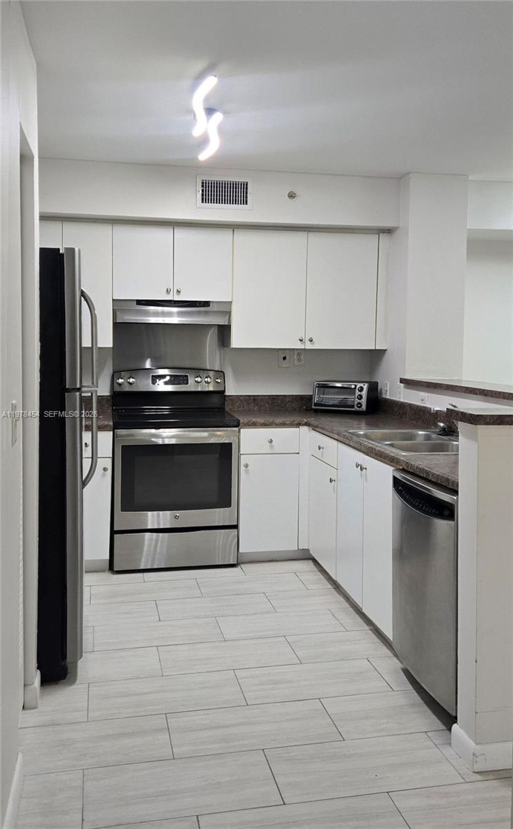 Photo of 7808 Sonoma Springs Cir #103, Lake Worth, FL 33463 (MLS # A11978454)