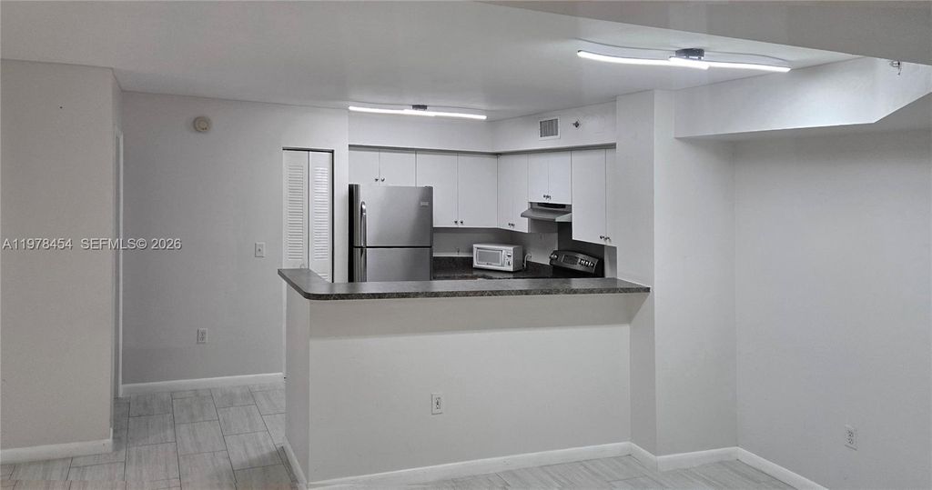 Photo of 7808 Sonoma Springs Cir #103, Lake Worth, FL 33463 (MLS # A11978454)