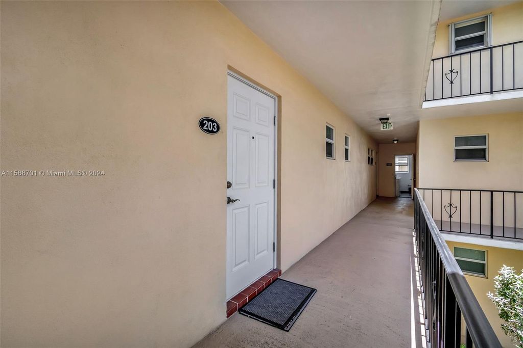 Photo of 16 Colonial Club Dr #203, Boynton Beach, FL 33435 (MLS # A11588701)