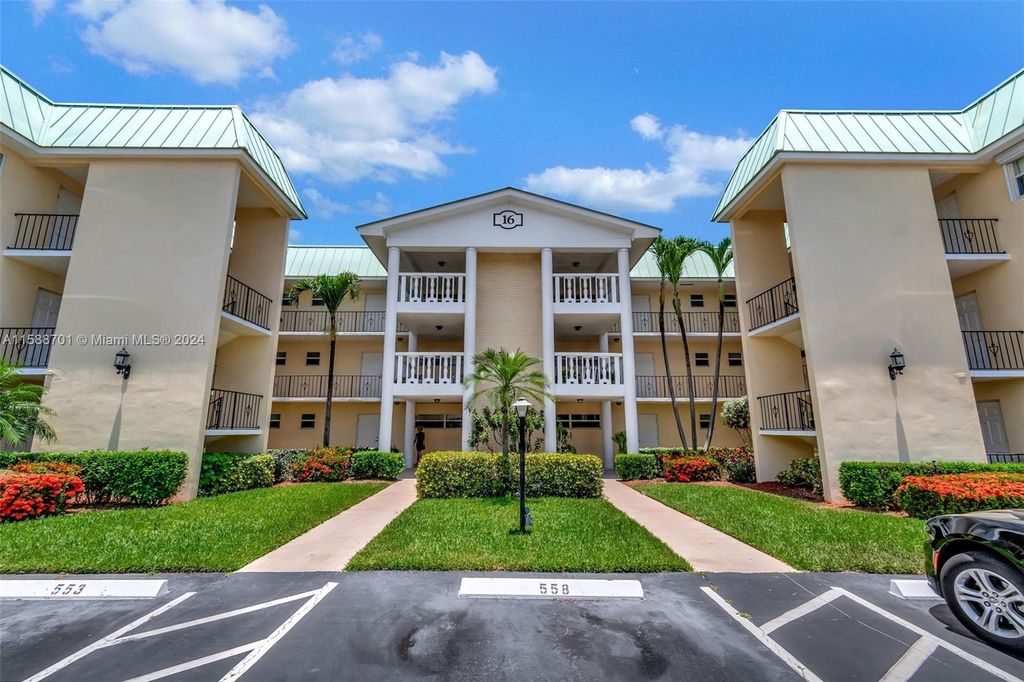 Photo of 16 Colonial Club Dr #203, Boynton Beach, FL 33435 (MLS # A11588701)