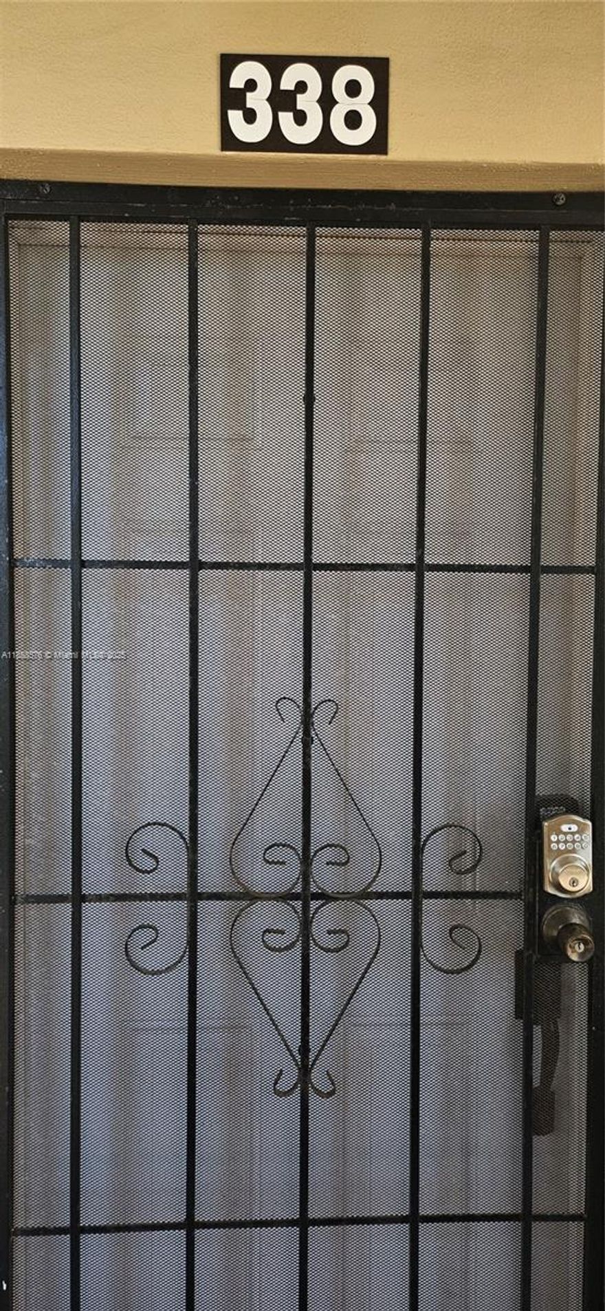 Spacious condo with peaceful patio overlooking tree filled courtyard.  Eat in kitchen. Tiled throughout with large white tiles in kitchen and living areas.  Contrasting large tiles in Primary Bedroom. Tastefully done.  Updated 2nd bathroom. Artwork does not convey. A/C approx. 6 yrs old.  Newer front door with additional security door which allows cross ventilation in the apartment.  Furniture is for sale.This section has security fencing around the parking areas.  Close to shopping, public transportation, medical, etc.