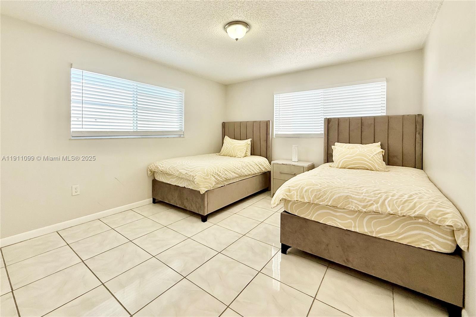 4122 COLLINS CONDO - Residential Lease