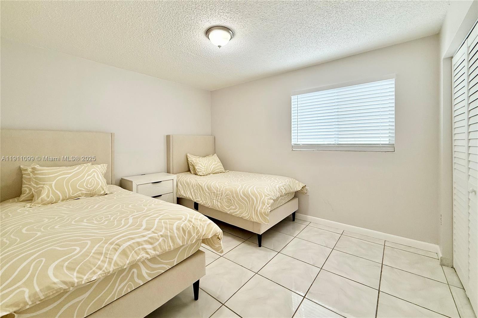 4122 COLLINS CONDO - Residential Lease