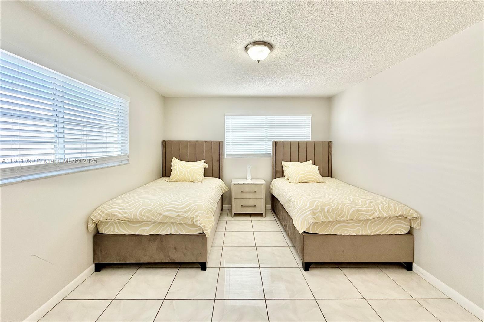 4122 COLLINS CONDO - Residential Lease