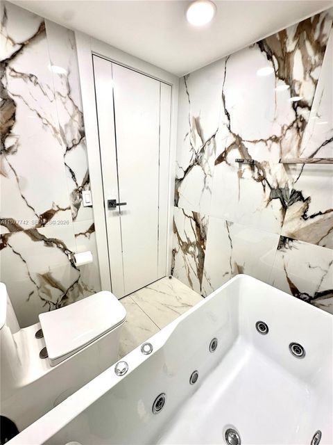 Tiny photo for 671 NE 195th St #205E, Miami, FL 33179 (MLS # A11977742)