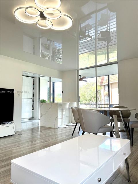 Tiny photo for 671 NE 195th St #205E, Miami, FL 33179 (MLS # A11977742)