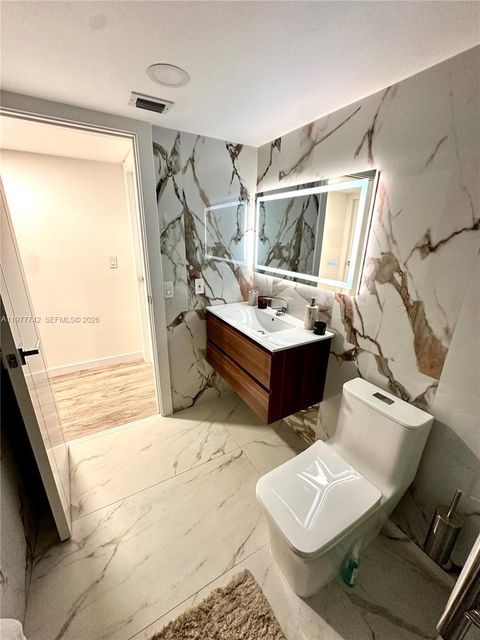 Tiny photo for 671 NE 195th St #205E, Miami, FL 33179 (MLS # A11977742)