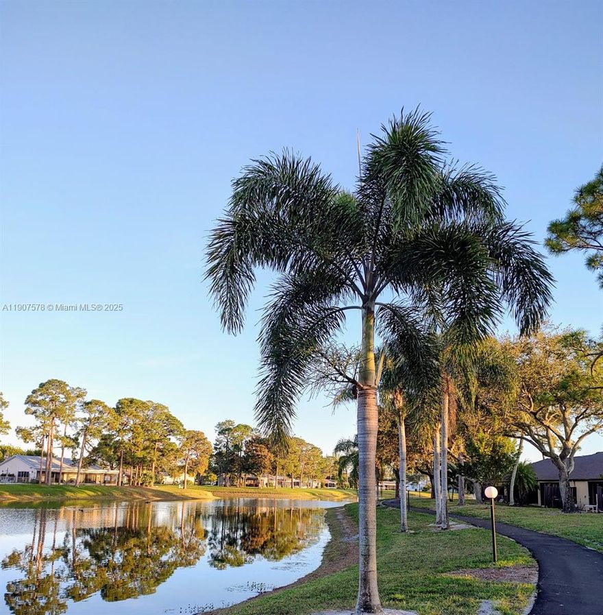 NEW 2024 roof.Updated 2/2 in 55+ Pine Ridge South IV.Don’t miss this great opportunity to own a beautifully maintained second-floor condo in the highly desirable 55+ community of Pine Ridge South IV. This unit offers a bright and spacious living/dining area, a screened-in patio with accordion shutters—perfect for enjoying your morning coffee—and generously sized bedrooms, each with walk-in closets. The primary bath has been tastefully updated with a modern shower. Newer A/C and water heater unit, new refrigerator, and dishwasher. The in-unit laundry room features a full-size washer and dryer for added convenience. Enjoy an active lifestyle with amenities such as a large heated pool, spacious clubhouse, bocce ball, shuffleboard, and a scenic walking path around the lake.