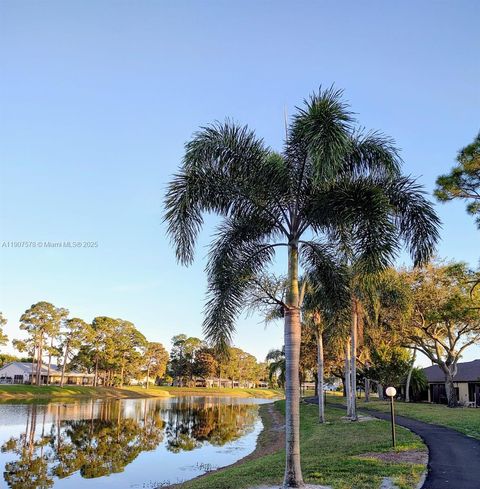 Photo of 442 Pine Glen Ln #D-2, Green Acres, FL 33463 (MLS # A11907578)