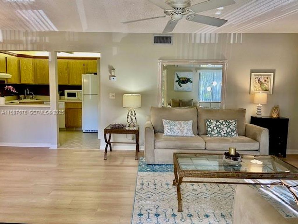 Photo of 442 Pine Glen Ln #D-2, Green Acres, FL 33463 (MLS # A11907578)