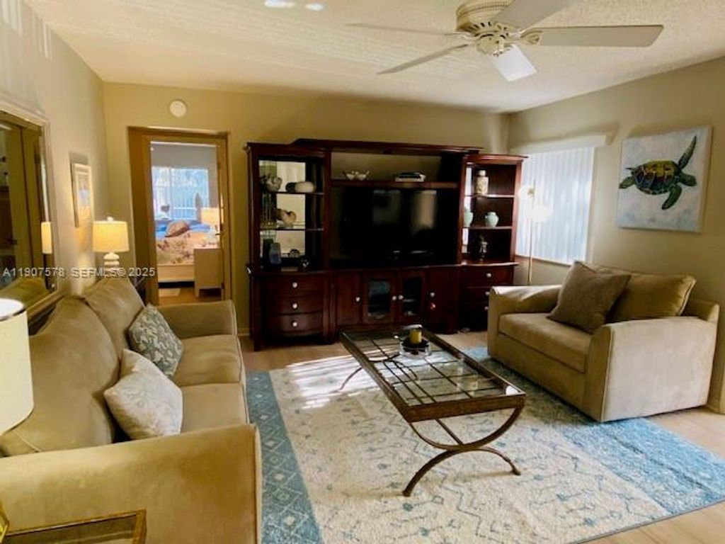 Photo of 442 Pine Glen Ln #D-2, Green Acres, FL 33463 (MLS # A11907578)