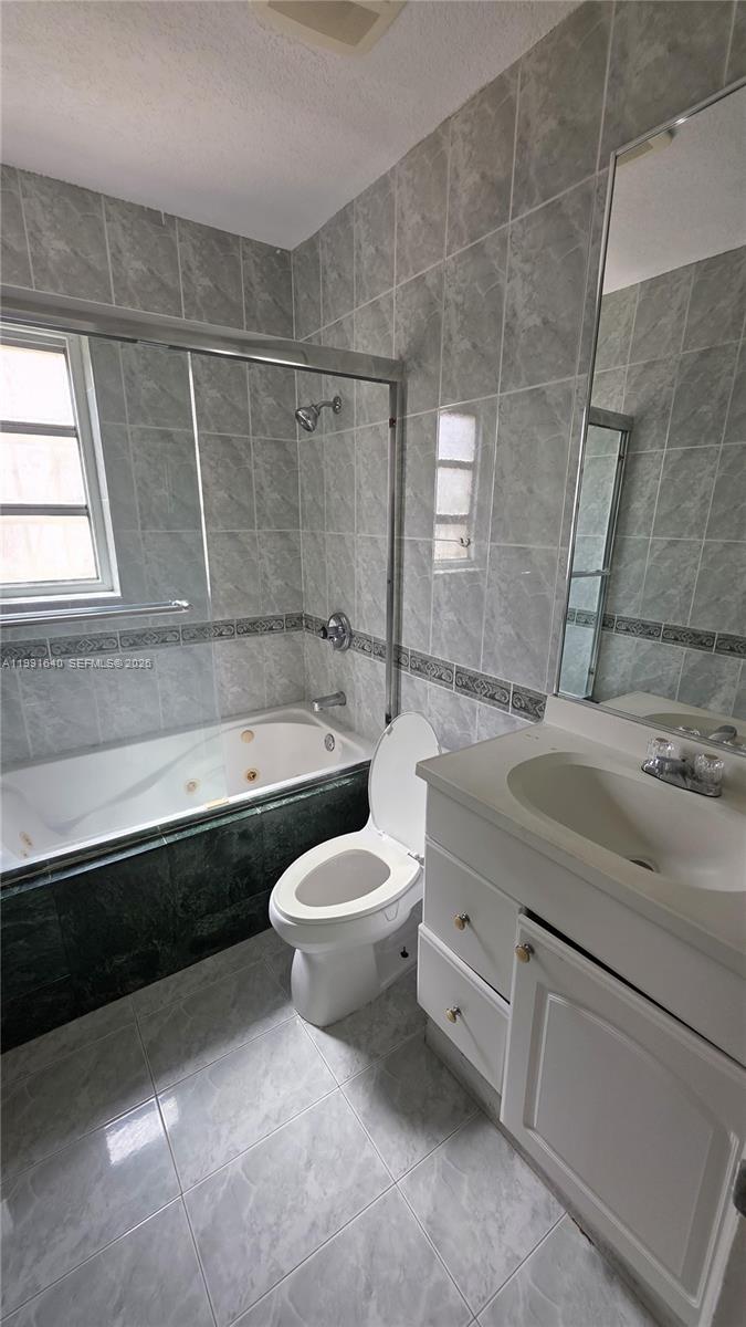 ALL FOUR INC CONDOMINIUM - Residential Lease
