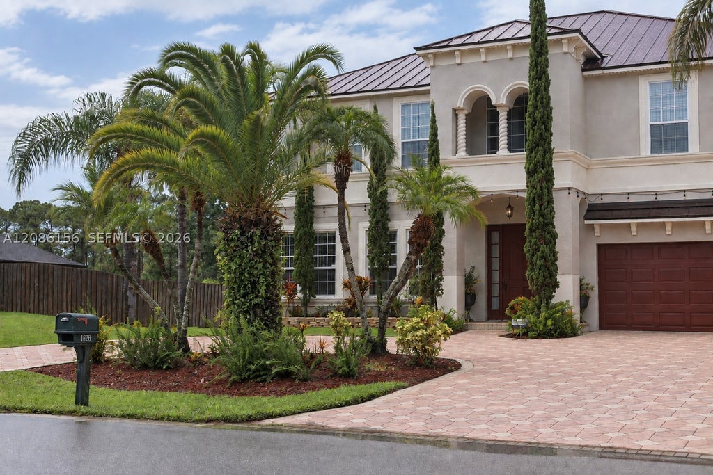 Photo of 1626 SW Mackenzie St, Port St Lucie, FL 34953 (MLS # A12086156)