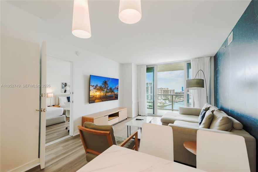 Experience resort-style living and exceptional flexibility at Beachwalk Resort with this high-floor, south-facing residence offering breathtaking panoramic views of the ocean and Intracoastal. Sold fully furnished and equipped, this turnkey condo-hotel unit has no rental restrictions, allowing daily, short-term, and vacation rentals. Enjoy premium amenities including two resort-style pools, an owners-only rooftop pool and lounge, on-site café and restaurant, fitness center, beach service with chairs and umbrellas, and private shuttle to the beach. Owners can self-park, and electricity, cable, and internet are included in the monthly HOA. A rare opportunity combining strong income potential with a true South Florida resort lifestyle.