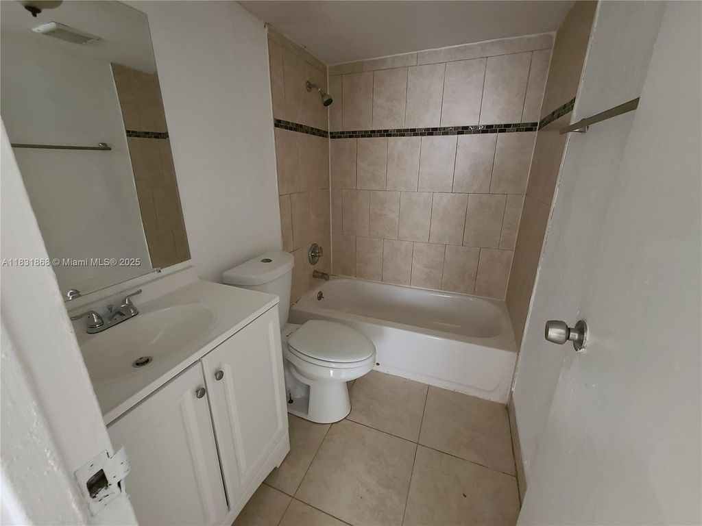 Photo of 1750 NW 55th Ave #103, Lauderhill, FL 33313 (MLS # A11831868)