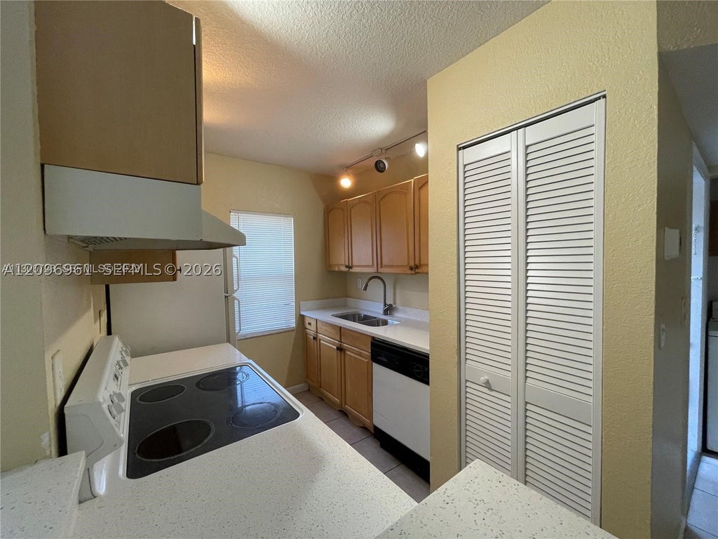Photo of 11626 NW 26th Ct #4, Coral Springs, FL 33065 (MLS # A12096961)