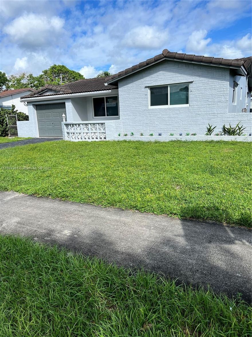 Spacious home with 3 large bedrooms and 2 bathrooms. Very large bedrooms. New kitchen cabinets and appliances. Room for circular or wide driveway. Large backyard with plenty of room for a swimming pool and to park an RV or boat. Double wide gate opening in alley. Conveniently located near medical facilities and hospital, shopping, grocery, restaurants, and elementary school. About 20 minutes to beach, Hard Rock Casino, and airport.
