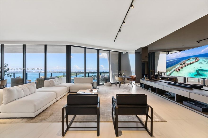 Unit 3502 at One Thousand Museum by Zaha Hadid offers a rare half-floor layout wrapped in floor-to-ceiling glass with unobstructed views of Biscayne Bay, the Atlantic Ocean, and the Miami skyline. This fully furnished Artefacto-designed home features Poliform cabinetry, quartz countertops, Sub-Zero & Gaggenau appliances, a custom wine display, motorized shades, and distinctive built-in furniture throughout. The primary suite includes an added walk-in closet and private terrace with sunset views. Enjoy world-class amenities including the Sky Lounge, Aquatic Center, Wellness Center, rooftop helipad, and 24/7 concierge, valet, and security — all just minutes from Miami’s waterfront, fine dining, and luxury shopping.  Artefacto furniture included.
