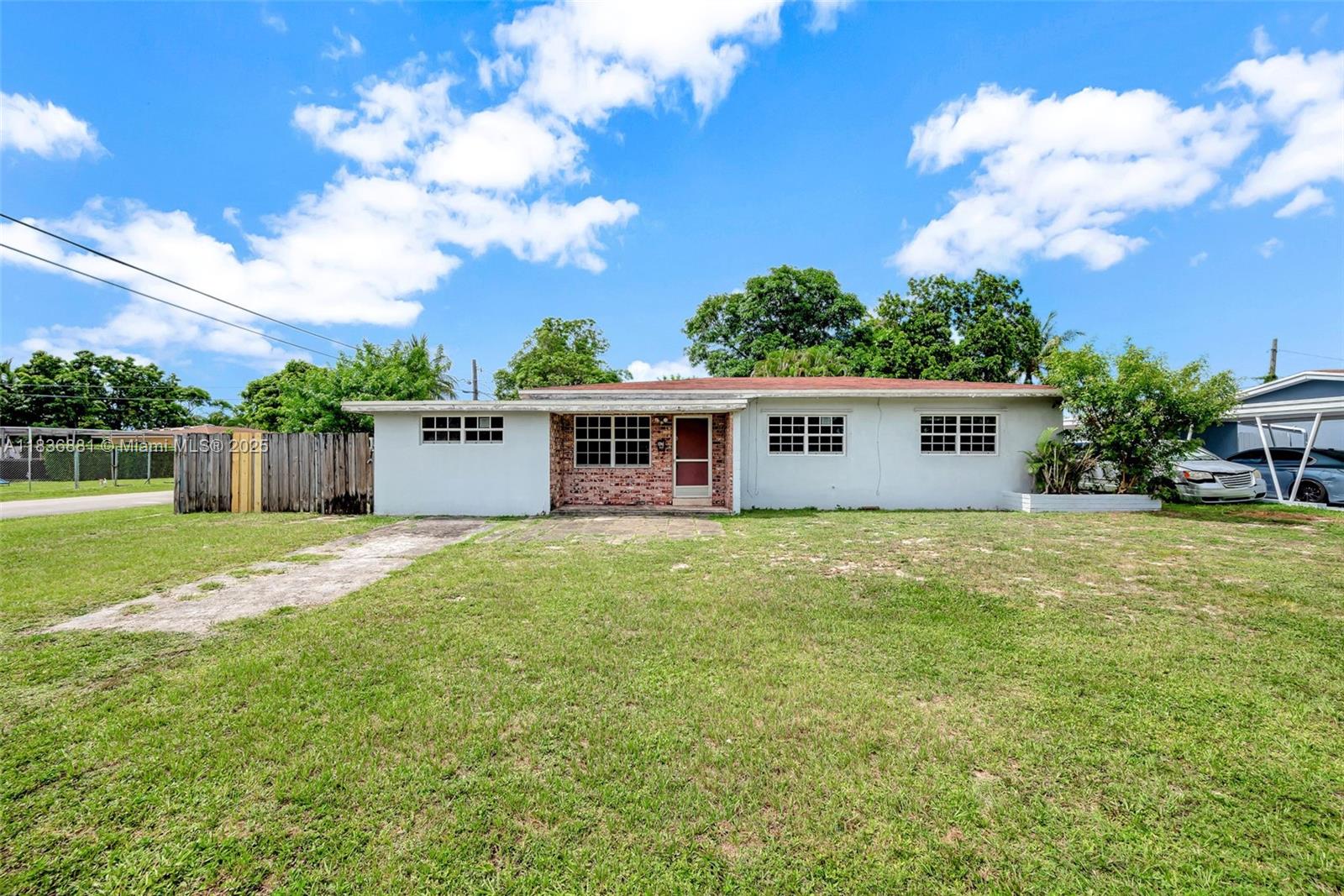 Spacious 4-bedroom, 2-bath home with endless potential, located near Miami Dade College North Campus. Situated on a corner lot with a large backyard and private pool, this property features a flexible floor plan, vintage charm, and abundant natural light. Ample living areas and an oversized Florida room offer great space for entertaining or relaxing. Ideal for those looking to customize in a growing neighborhood with no HOA. Convenient access to major highways, parks, schools, and transit. Great opportunity to create your dream home. Make your appointment today!
